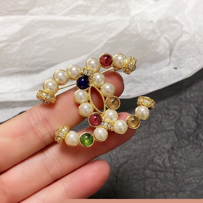 Ch*el brooches